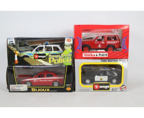 Bburago, Polistil - Four boxed diecast 'Emergency' vehicles in 1:24 / 1:26 scale. Lot consists of Bburago #0185 Ford Mustang 