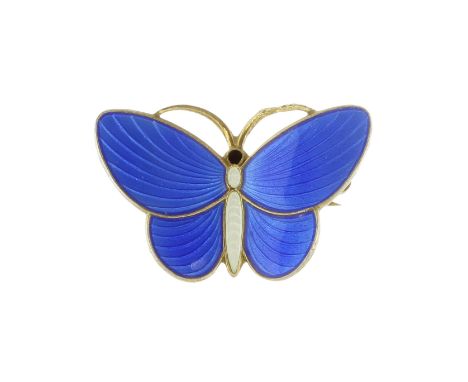 An antique Norwegian enamel butterfly brooch in sterling silver designed as a butterfly, with blue enamel wings and white and