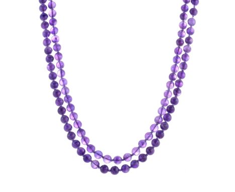 A vintage two strand amethyst bead necklace in yellow gold designed as two graduated strands of one hundred and forty eight (