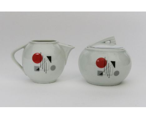 A Bareuther Bavarian Constructivist milk-jug and covered sugar basin, printed in black and red printed factory marks, 7.5cm. 