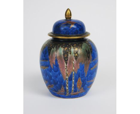 'Forest Tree' an Art Deco Carlton Ware ginger jar and cover, pattern 3244, enamelled in colours on a matt blue ground, highli