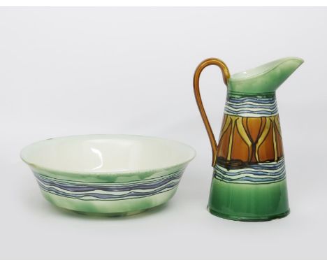 A Minton's Secessionist wash basin and ewer designed by Leon Solon and John Wadsworth,  model no.35, tubeline decorated with 