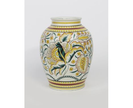 A Poole Pottery  vase by K Hickosson, pattern LB, painted with stylised flowers and foliage in yellow, mushroom and green on 