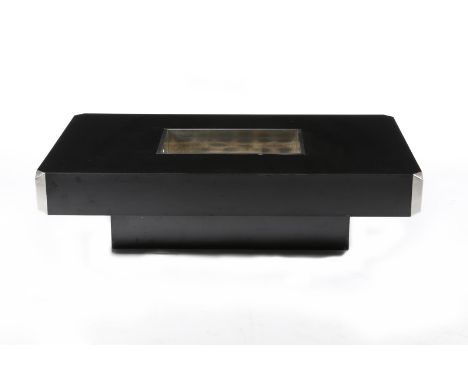 A Cidue black veneer and chromed metal low table designed by Willy Rizzo,  rectangular section on central pillar, the table t