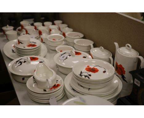 Susie Cooper for Wedgwood, an extensive collection of 'Corn Poppy' tableware, comprising a large oval serving platter, eight 