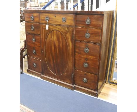 A George III line-inlaid mahogany breakfront side cabinet, fitted with an arrangement of eight short drawers (including two c