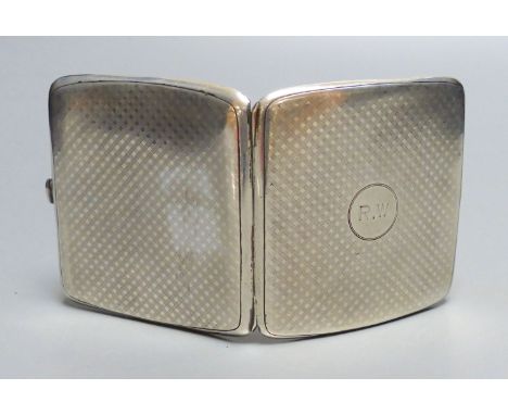 A George V engine turned silver cigarette case, Mappin &amp; Webb, Birmingham, 1911, 89mm, gross 3.5oz.