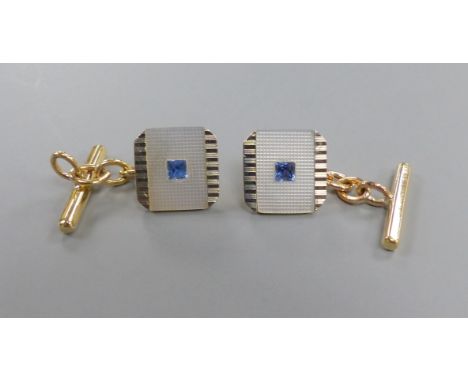 A cased pair of early to mid 20th century 18ct &amp; 9ct, mother of pearl and sapphire set square cufflinks, 12mm, gross 4.6 