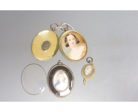 Three 19th century yellow metal mounted and cased portrait miniatures on ivory, one blue enamelled