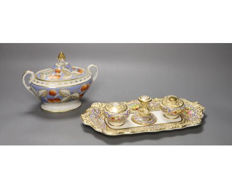 A Copeland and Garrett inkstand with fixed pots and candlestick and two covers, painted with panels of fruit on a pale yellow