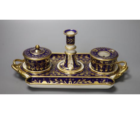 A Derby inkstand ornately gilded on a cobalt blue ground having a sander and cover, inkpot and taper stick, red marks, width 