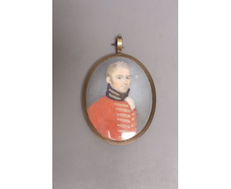 A late 18th century portrait miniature of a military gentleman on ivory, hair and opaline glass back