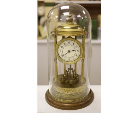 A gilt brass Anniversary clock having swag-decorated enamel Arabic dial, on circular wooden plinth under glass dome, height 4