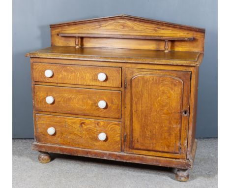 A Late Victorian Grained as Oak Kitchen Chiffonier, the low angled back fitted one shelf, fitted three drawers to left hand s