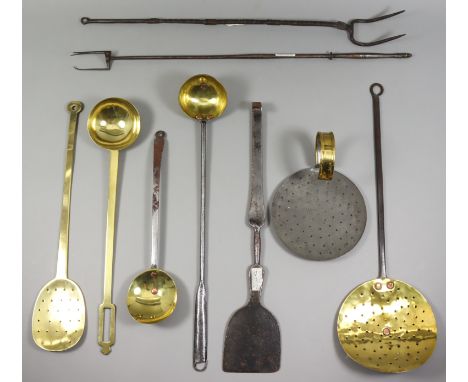 A Wrought Iron Two-Prong Fork, 18th Century, the upper surface with "chip" decoration, 26ins, and a collection of cooking imp