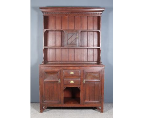 A Late 19th Century Red Painted Pine Kitchen Dresser, the upper part with deep moulded cornice above dentil frieze, fitted tw