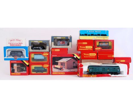 A set of Hornby 00 gauge railway models. This includes models of a goods shed and water tower, &nbsp;aswell as models of rail