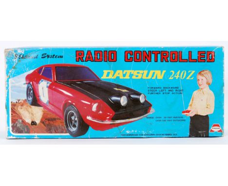 A vintage 1970's radio controlled Datsun 240z car&nbsp;by Asahi. ' this has a range of 30 feet indoors and 100 feet outdoors.