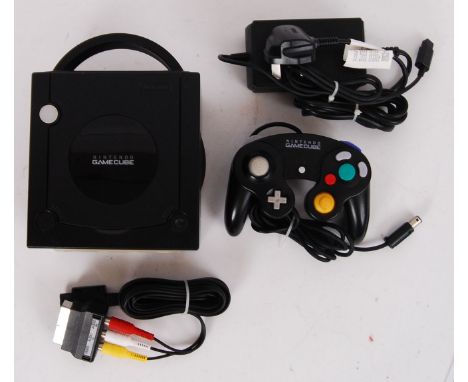 An original retro Nintendo Gamecube games console with controller, TV and power cables. Unboxed.&nbsp;

POSTAGE: Worldwide Po