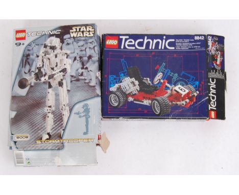 Two original vintage Lego Technics sets. The first being Star Wars 8008 Stormtrooper, the other being Tecnics 8842. Both with