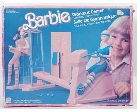 A 1980's Barbie Fitness Center in its original box, by Mattel. Appears complete. 40cm long. &nbsp;

POSTAGE: Worldwide Postag