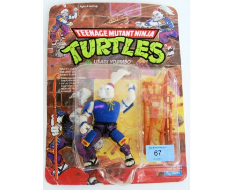 &nbsp;An original vintage 1990's Playmates made Teenage Mutant Ninja Turtles 19 back carded Usagi Yojimbo action figure. Slig