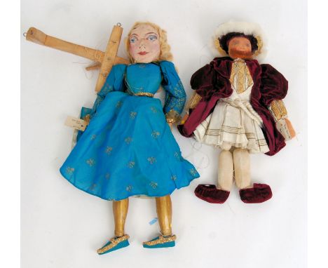 A pair of vintage style puppets. One of them being King Henry VIII, the other a female. The female puppets measures 49cm and 