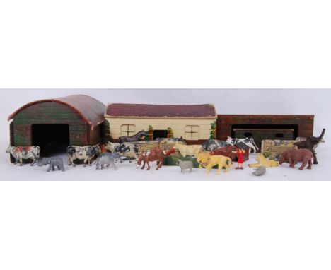 &nbsp;A vintage wooden farm set, possibly by Britains, including a farm house and out buildings. Also contains a box of lead 