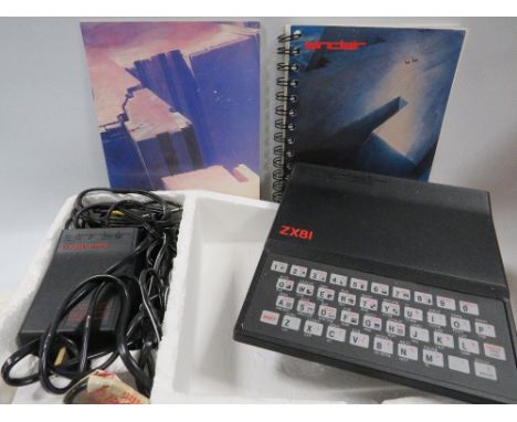A boxed Sinclair ZX81 in original box with instruction manual etc 