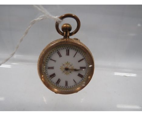 A small 14c gold cased fob watch with decorative enamel dial and chased engraving 