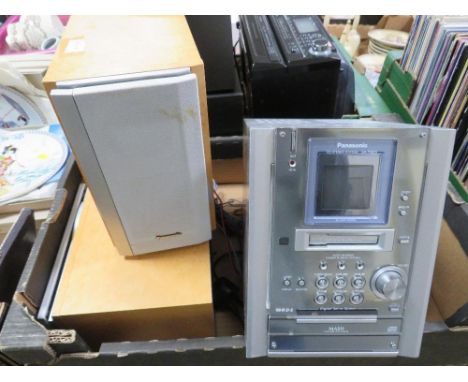 A Panasonic mini music centre wtih a pair of matching Panasonic loud speakers and remote control together with a Steepletone 