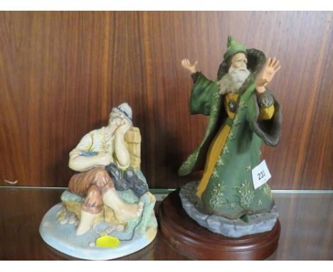 An Enchantica figure of a wizard in a green cloak together with a Naturecraft figure entitled 'Spring Wizard' with certificat