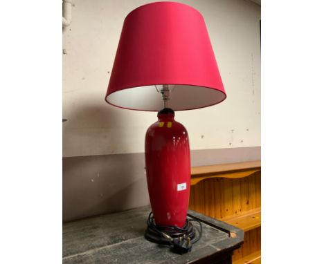 A large modern red table lamp and shade H 75 cm (inc. shade) 