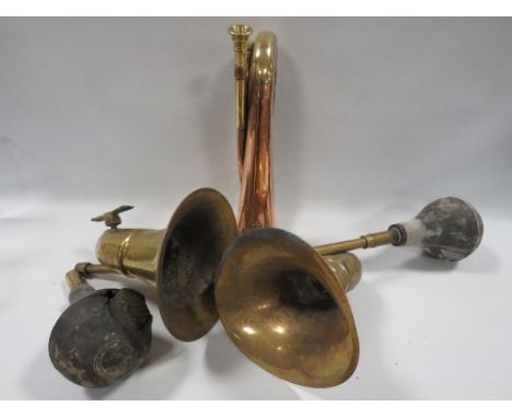 A military bugle together with two vintage car horns A/F 