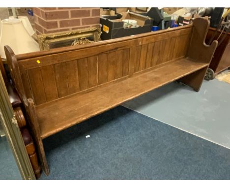 An antique pine church pew L 228 cm 