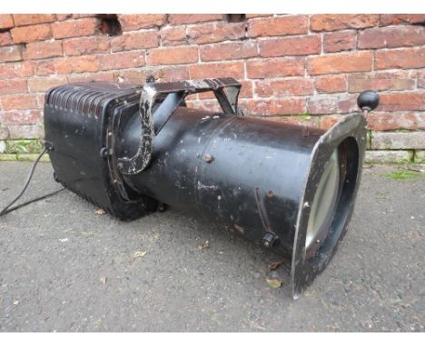 A large 1960s Furse stage lamp, L 98 cm, with glass lens approx. Dia. 28 cm - in working order at time of consignment (see im