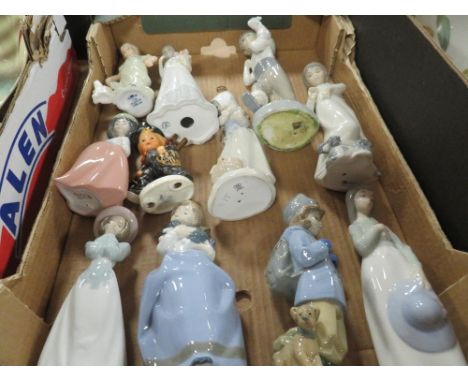 A tray of assorted figurines to include various Nao figures 