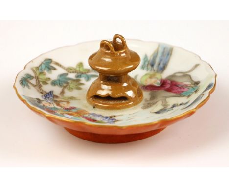 A Chinese porcelain famille rose incense stand, 20th century, of shaped circular form and decorated with figures and a water 