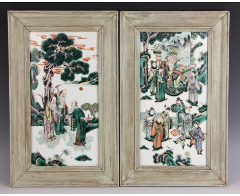 A pair of Chinese porcelain famille verte panels, 19th/20th century, the panels decorated with a scene of a seated emperor wi
