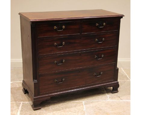 George III mahogany chest of drawers, the crossbanded top above two short and three graduated long, oak lined and cock beaded