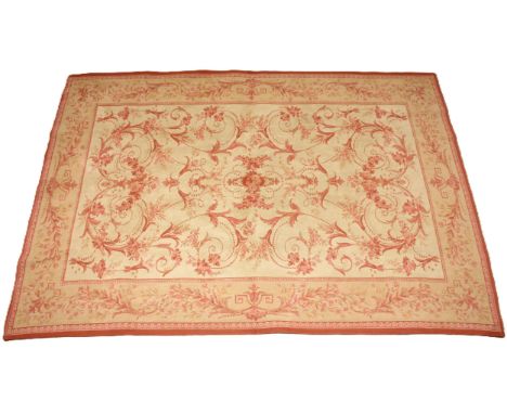 A Laura Ashley wool and cotton rug or wall hanging, late 20th century, the central foliate panel on pale ochre ground within 