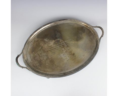 A Victorian silver tray, Daniel &amp; John Wellby, London 1895, the twin handles above an oval tray engraved 'Presented to Ja