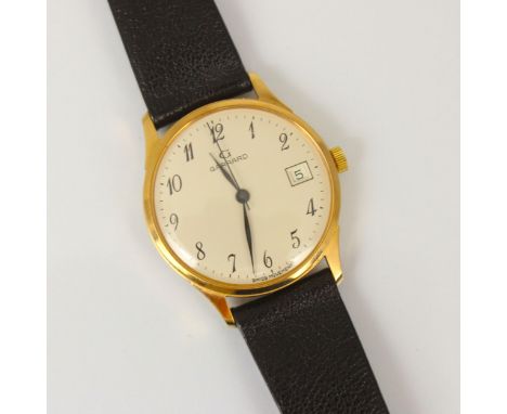 A late 20th century 9ct cased Garrard wristwatch, the white circular dial with Arabic numerals and date aperture to 3 o'clock