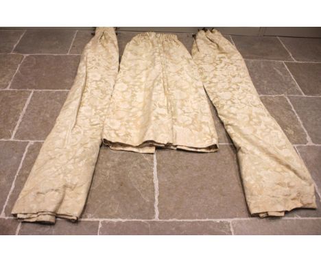 A pair of ivory coloured floral jacquard fabric interlined curtains with plain white backing, drop 230cm, each approximately 