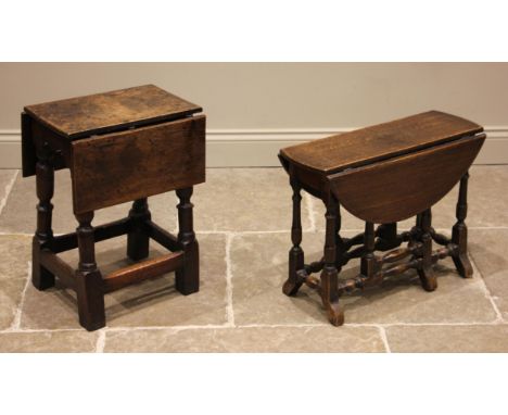 An 18th century oak jointed drop leaf occasional table, of small proportions, the rectangular top over a shaped apron, upon t