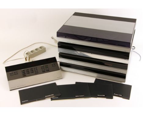 A Bang & Olufsen stacking HiFi system, comprising: a Beogram 5005, a Beogram CD 6500, a Beomaster 5000, a Beocord 5000, and a