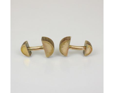 A pair of white metal Tiffany and Co cufflinks, the grooved semi circular links with fixed toggle and further semi circle to 