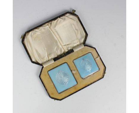 A cased George V silver and enamel cigarette case and compact, William Neale & Son, Birmingham 1939, the cigarette case of re