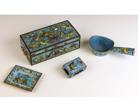 A Chinese enamel cigarette box, Canton, late 19th century, of rectangular form with hinged cover and decorated in relief with