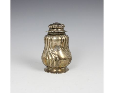 A late 19th century German white metal tea caddy, by Hessenberg &amp; Co, Frankfurt, the domed cover above baluster shaped bo